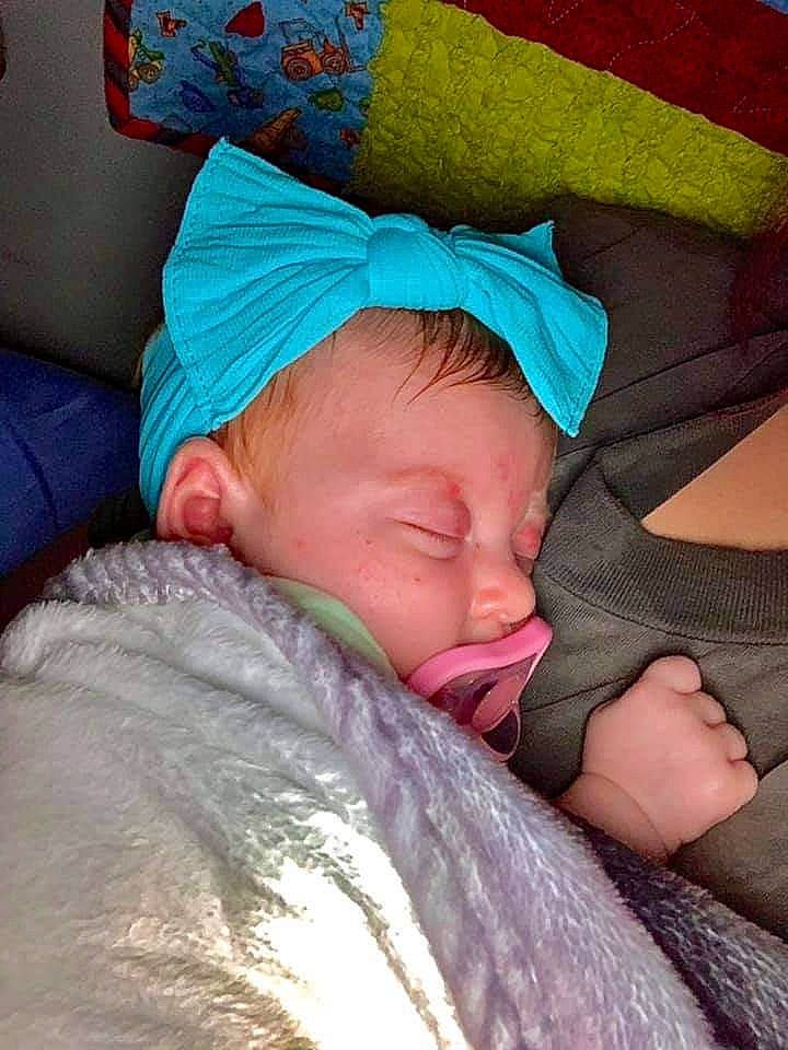 Adalyn joined the competition — help win amazing prizes! baby, baby_sleeping, baby_toddler_clothing, cap, cheek, child, close_up, comfort, eye, finger, head, headgear, linens, lip, mouth, nose, person, pink, skin, textile