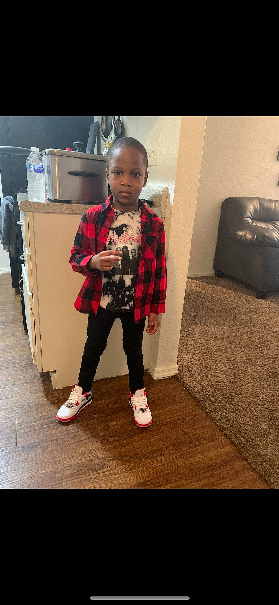 Devon joined the competition — help win amazing prizes! bag, eyewear, fashion_design, floor, flooring, formal_wear, happy, hardwood, human_leg, knee, luggage_and_bags, pattern, person, plaid, room, sleeve, street_fashion, tartan, toddler, waist