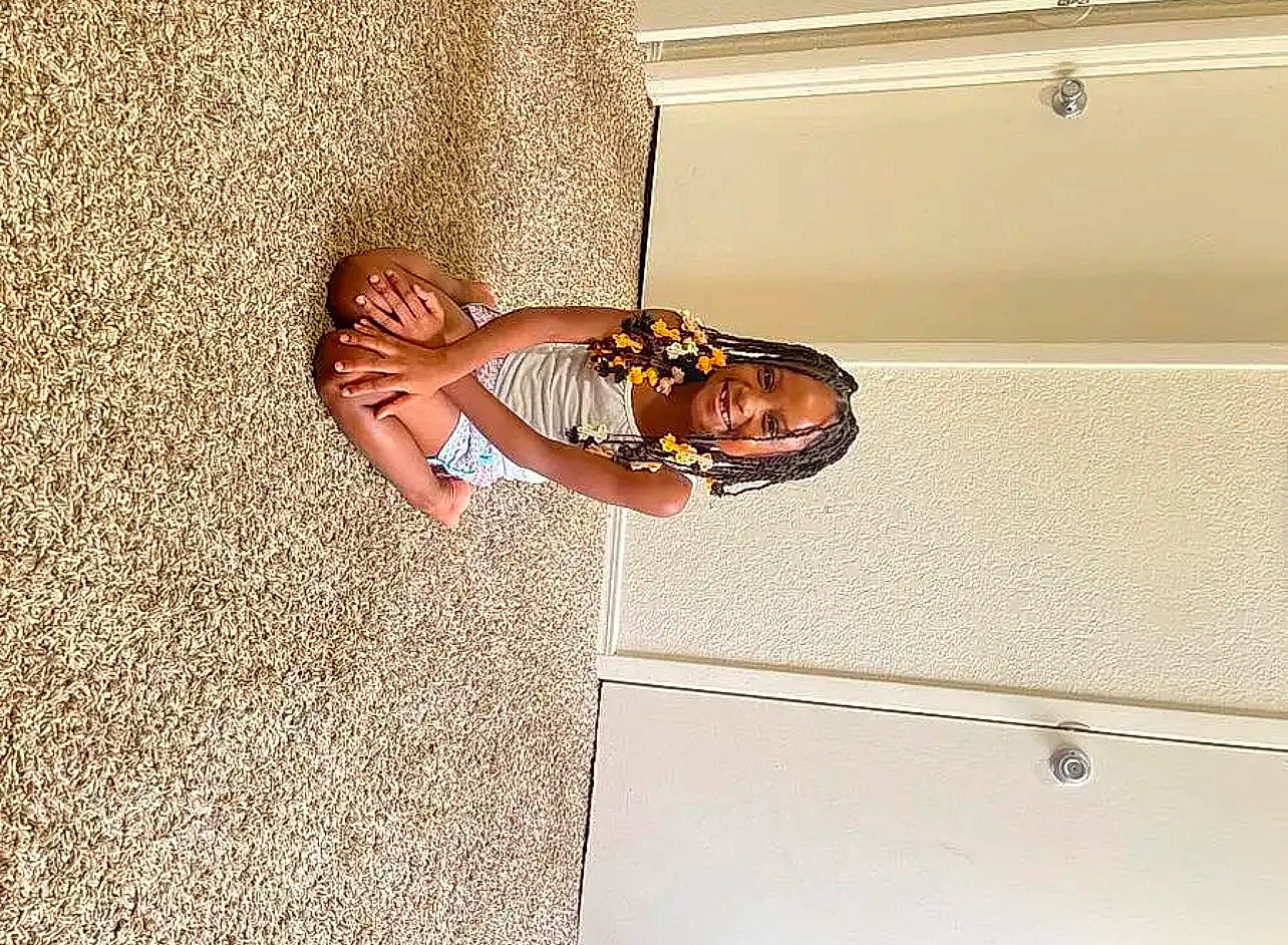 Danesha joined the competition — help win amazing prizes! dress, elbow, fawn, floor, flooring, foot, fun, hardwood, human_body, human_leg, joy, leg, leisure, person, room, sunglasses, thigh, tints_and_shades, toddler, tree