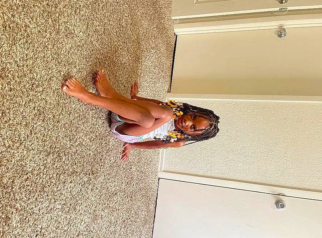 Danesha joined the competition — help win amazing prizes! arm, dress, fawn, floor, flooring, footwear, hand, human_body, human_leg, knee, leg, leisure, people_in_nature, person, sandal, shorts, thigh, tints_and_shades, toddler, tree