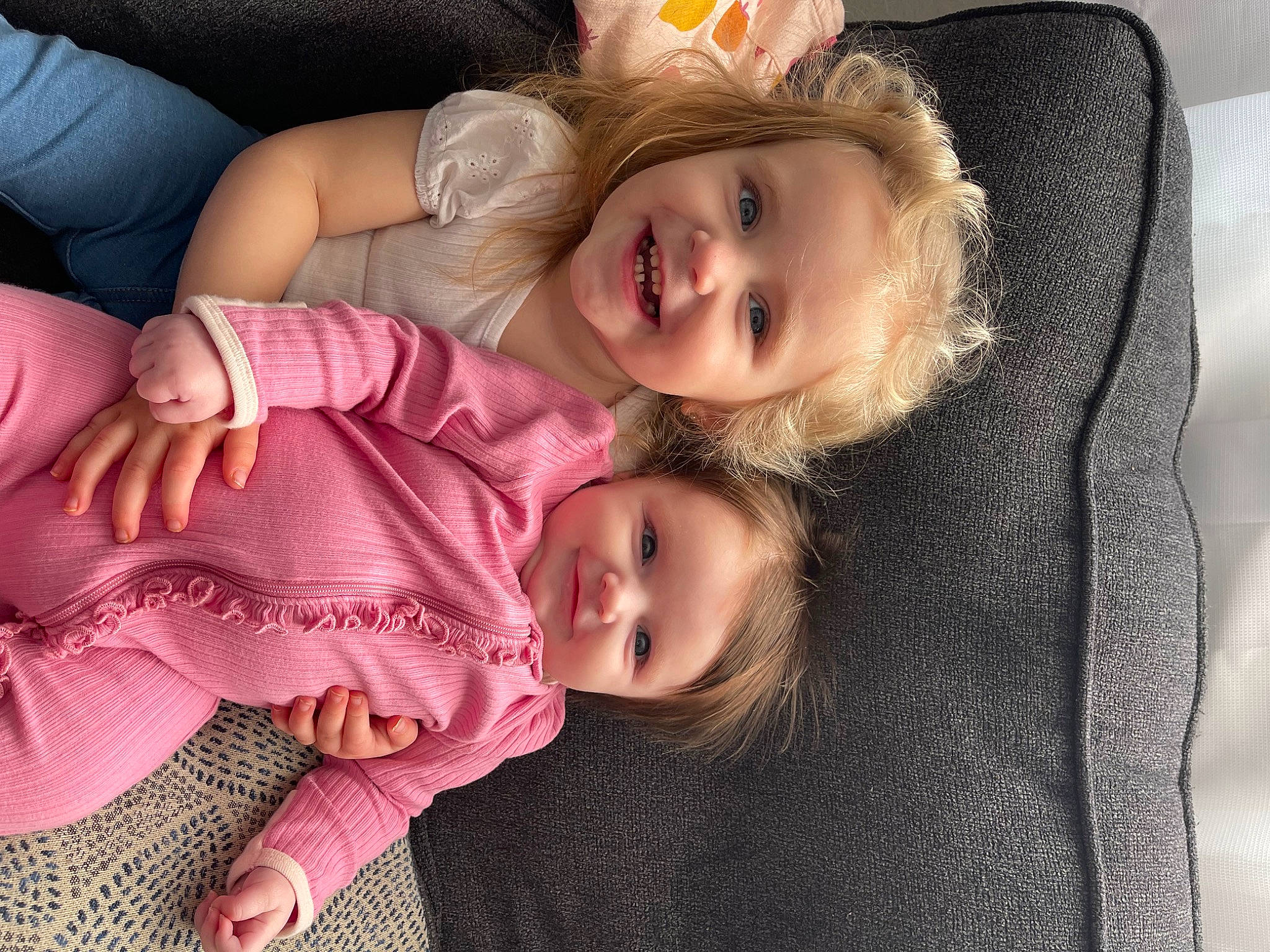 Maeve is registered to the contest to win money with this photo: baby_toddler_clothing, cheek, comfort, eye, face, facial_expression, gesture, happy, head, iris, joy, lip, mammal, mouth, nose, person, skin, sleeve, smile, textile