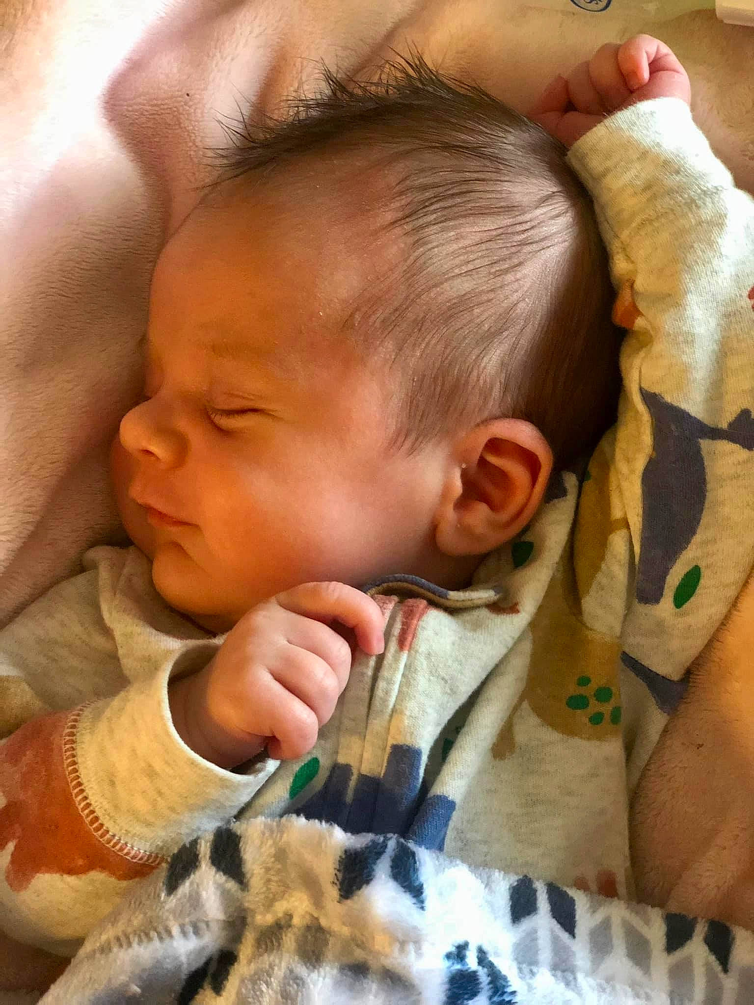 Michael is registered to the contest to win money with this photo: baby_toddler_clothing, cheek, chin, comfort, ear, eye, eyebrow, eyelash, facial_expression, forehead, hairstyle, hand, head, human_body, lip, mouth, neck, nose, organ, person