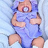 Kaitlyn joined the competition — help win amazing prizes! baby, infant, sleeping, pacifier, bonnet, striped_outfit, purple, white, blanket, fluffy, portrait, close_up, indoors, lying_down, child, peaceful, cute, socks, ruffles, text_overlay