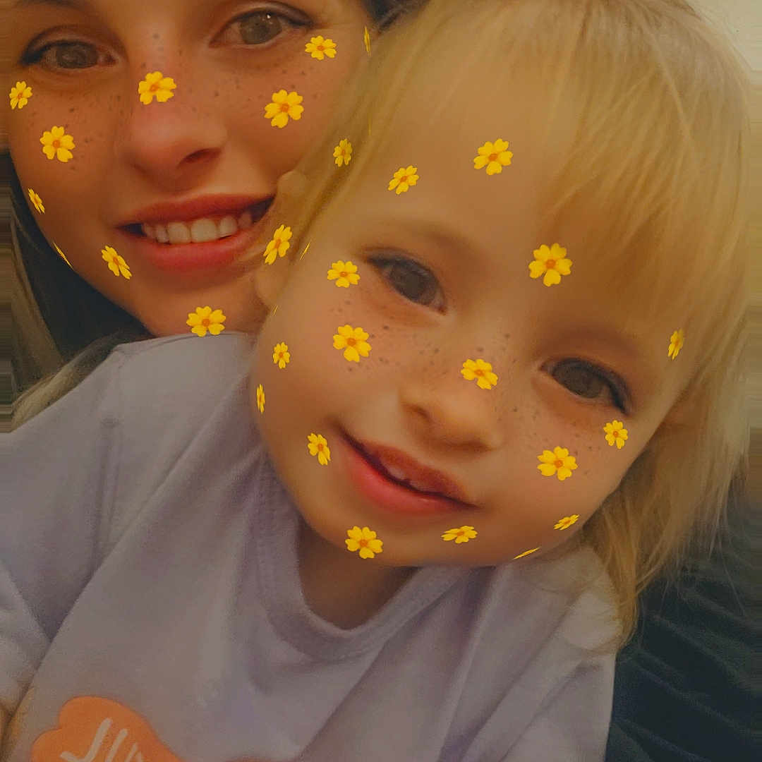 Armani is registered to the contest to win money with this photo: baby, bodypart, clothing, couch, face, finger, furniture, hand, happy, head, mouth, pattern, person, photography, portrait, selfie, smile, t_shirt, teeth, toy