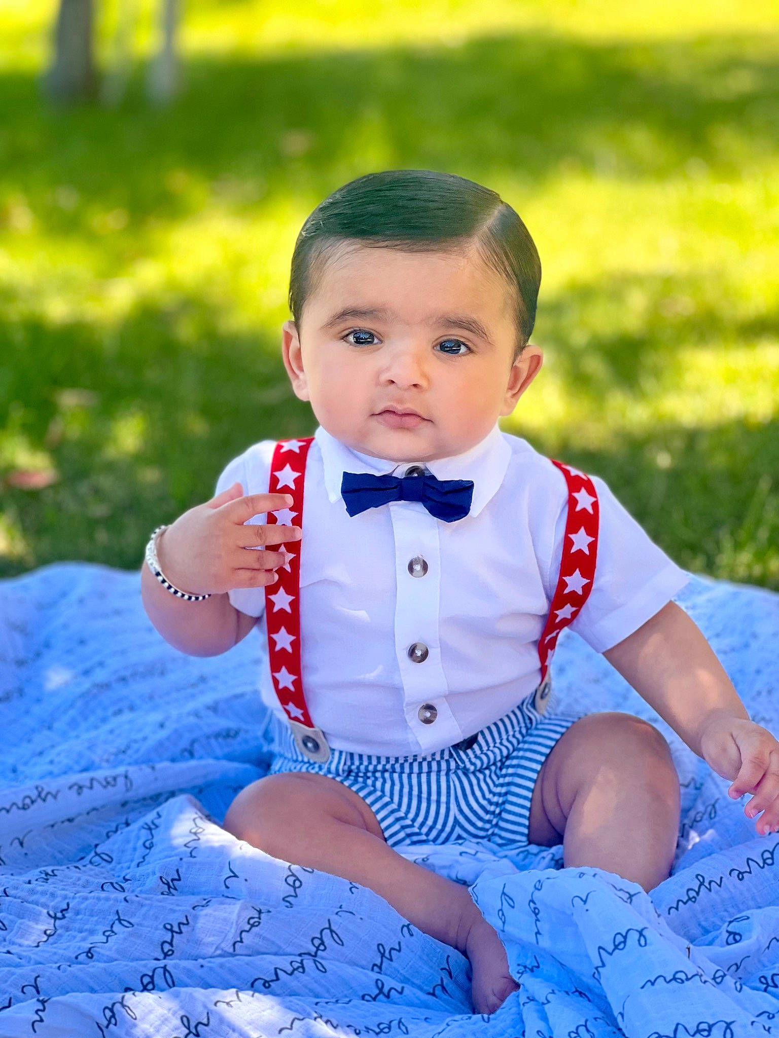 Waris Dhanota joined the competition — help win amazing prizes! baby, baby_toddler_clothing, blue, child, electric_blue, finger, flash_photography, formal_wear, grass, hand, happy, leaf, leisure, pattern, people_in_nature, person, plant, sitting, sleeve, toddler