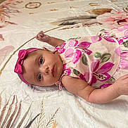 Mckenna joined the competition — help win amazing prizes! arm, baby, blanket, child, cute, eyes, face, floral_pattern, girl, hand, headband, indoors, infant, lying_down, pink_clothing, portrait, resting, skin, soft_texture, young