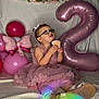 Sailor is registered to the contest to win money with this photo: child, girl, birthday, cupcake, pink_dress, balloons, number_two_balloon, glasses, flower_garland, celebration, sitting, soft_blanket, happy, party, indoor, cute, smile, shoes, ribbon, toddler