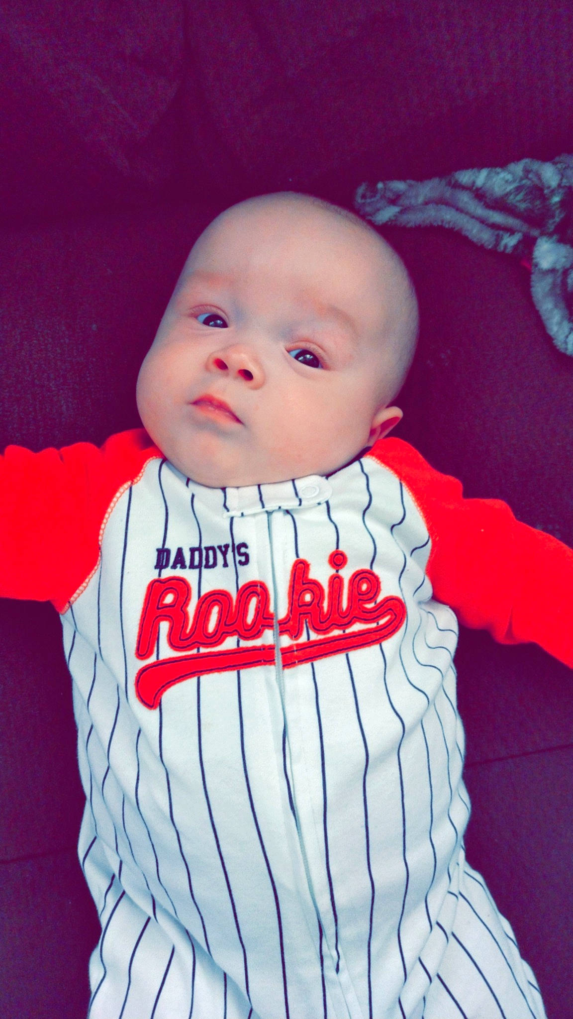 Isaiah joined the competition — help win amazing prizes! baby, baby_toddler_clothing, cheek, comfort, cool, eye, finger, flash_photography, gesture, happy, lip, mouth, neck, nose, orange, person, pink, skin, sleeve, t_shirt