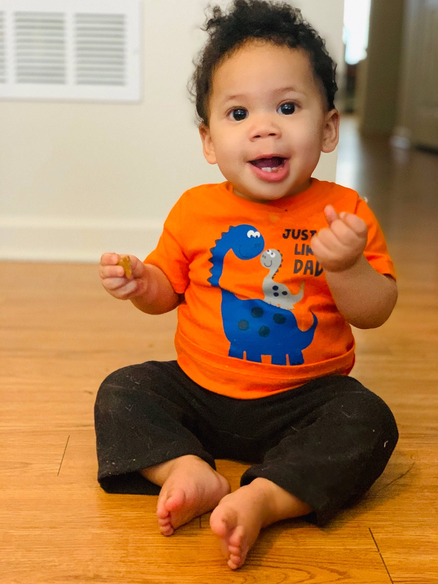 Elon joined the competition — help win amazing prizes! baby, baby_toddler_clothing, child, orange, person, play, sitting, toddler