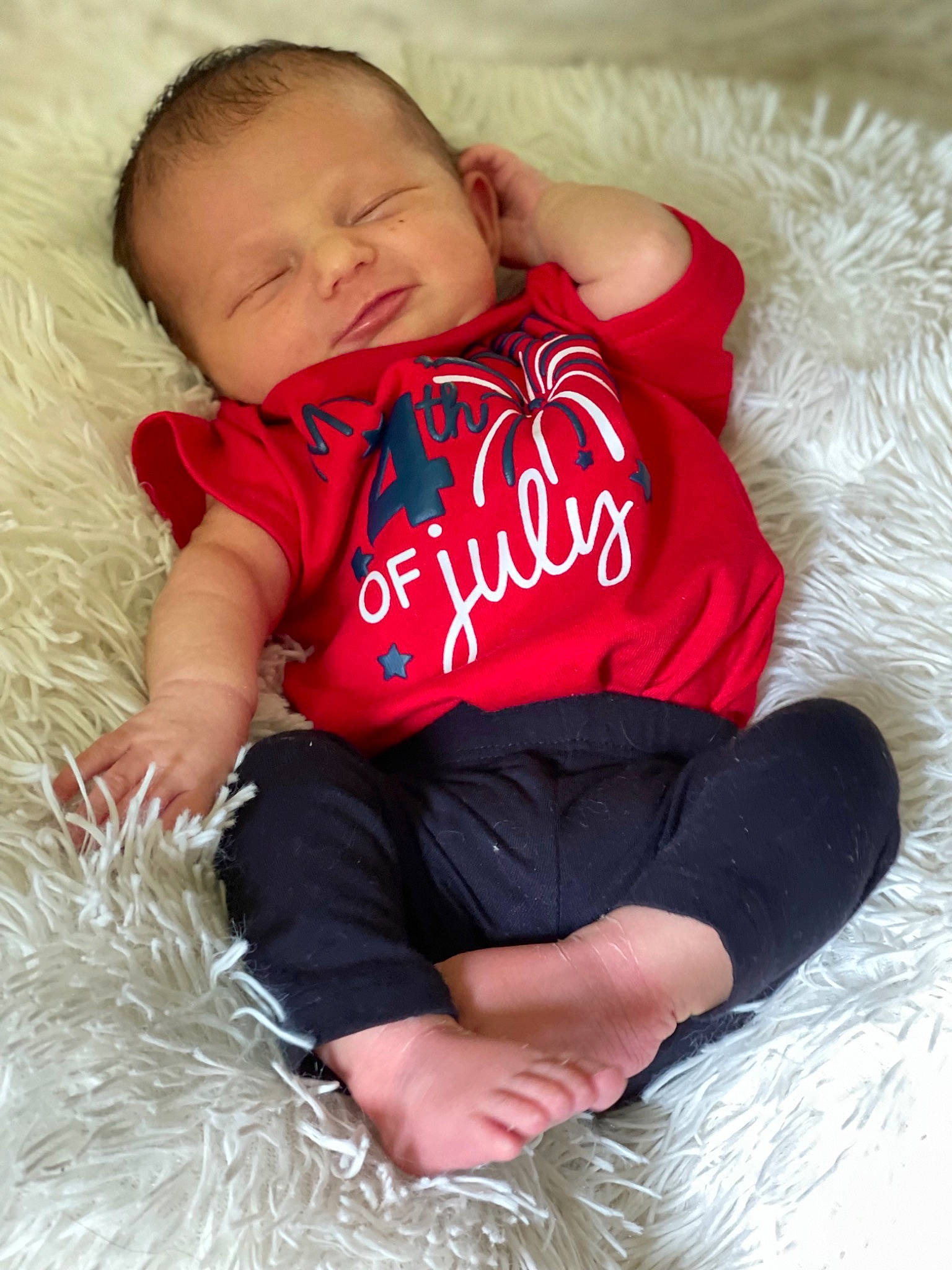 Nevaeh is registered to the contest to win money with this photo: arm, baby, baby_sleeping, baby_toddler_clothing, child, comfort, couch, eye, face, hand, happy, head, person, pink, red, skin, sleeve, stomach, textile, thigh