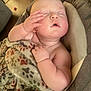 Chase is registered to the contest to win money with this photo: baby, sleeping, blanket, paw_print, hand, face, arm, chair, comfort, nap, cozy, infant, skin, relaxation, indoors, cushion, peaceful, child, portrait, rest