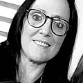 Corinne M.