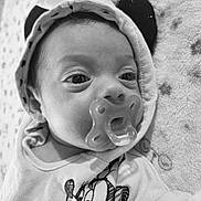 Irene joined the competition — help win amazing prizes! baby, pacifier, hood, black_and_white, closeup, infant, blanket, cartoon_character, face, cute, child, soft_texture, sleepwear, ears, expression, lying_down, portrait, young, monochrome, clothing