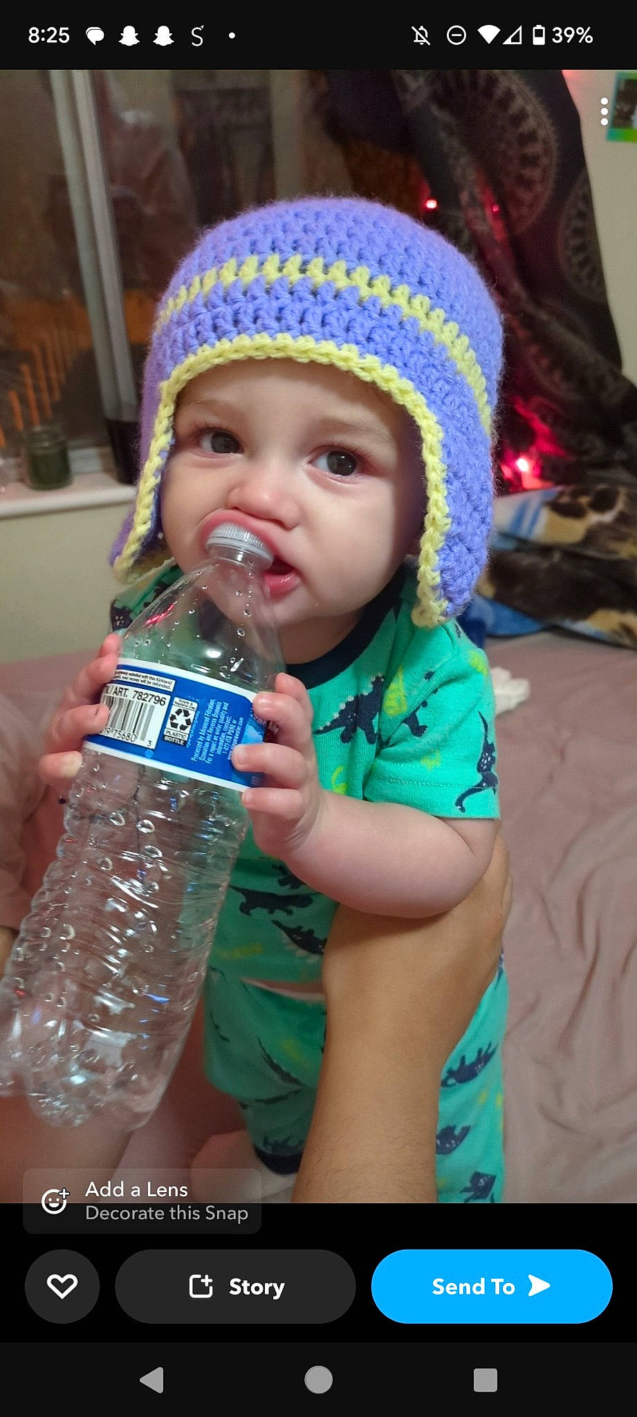 Jasiah joined the competition — help win amazing prizes! baby, baby_toddler_clothing, bottle, bottled_water, cap, child, drink, drinking, drinking_water, drinkware, facial_expression, finger, fun, hand, happy, headwear, knit_cap, person, plastic_bottle, toddler