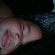 Ezra is registered to the contest to win money with this photo: child, face, closeup, sleeping, blurred, dark, fabric, pattern, portrait, person, skin, head, eyebrows, lips, indoor, resting, cozy, soft, young, human