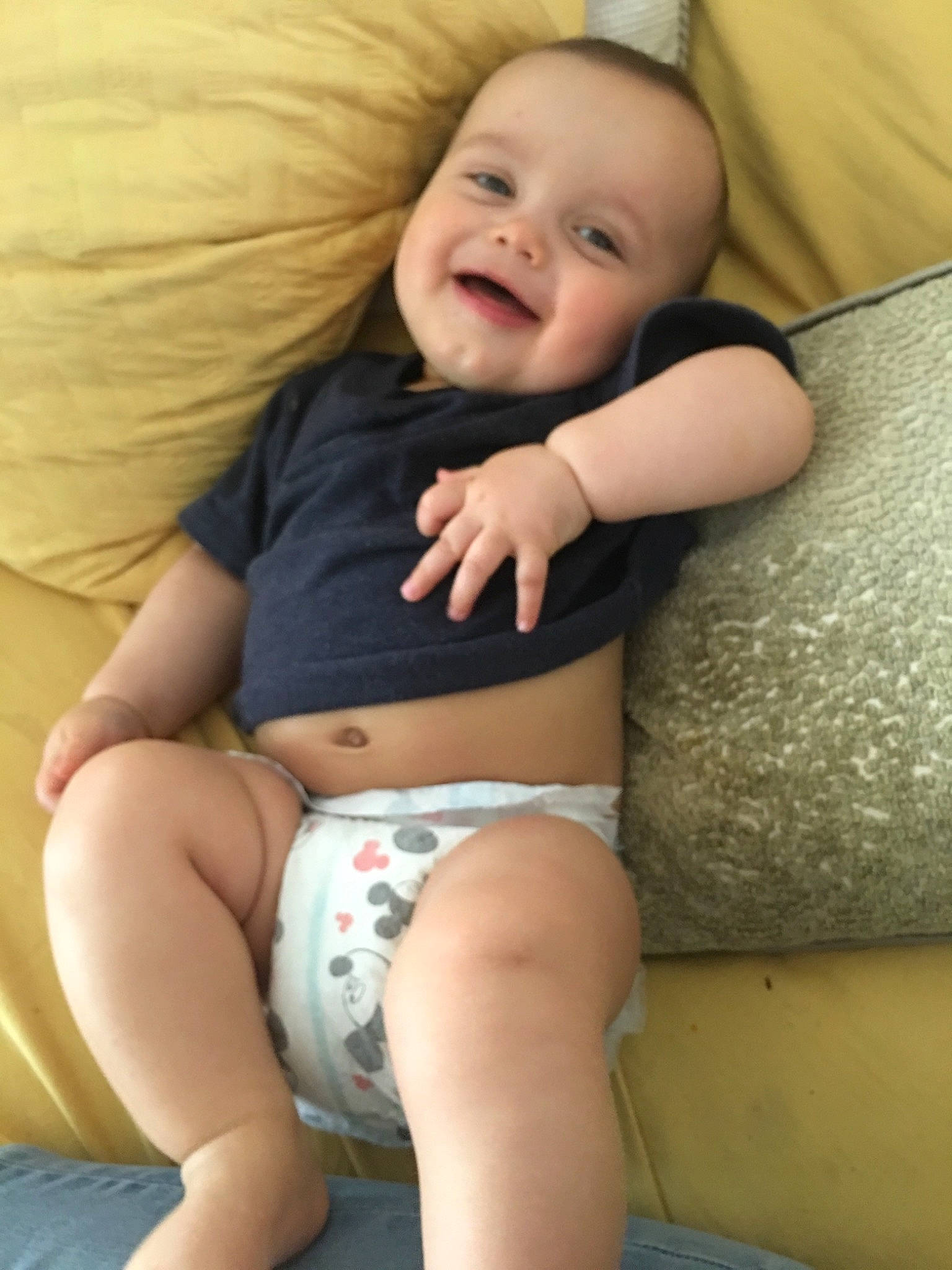 Carter is registered to the contest to win money with this photo: abdomen, arm, baby, blond, cheek, child, human_body, human_leg, knee, leg, person, sitting, skin, smile, stomach, thigh, toddler, trunk
