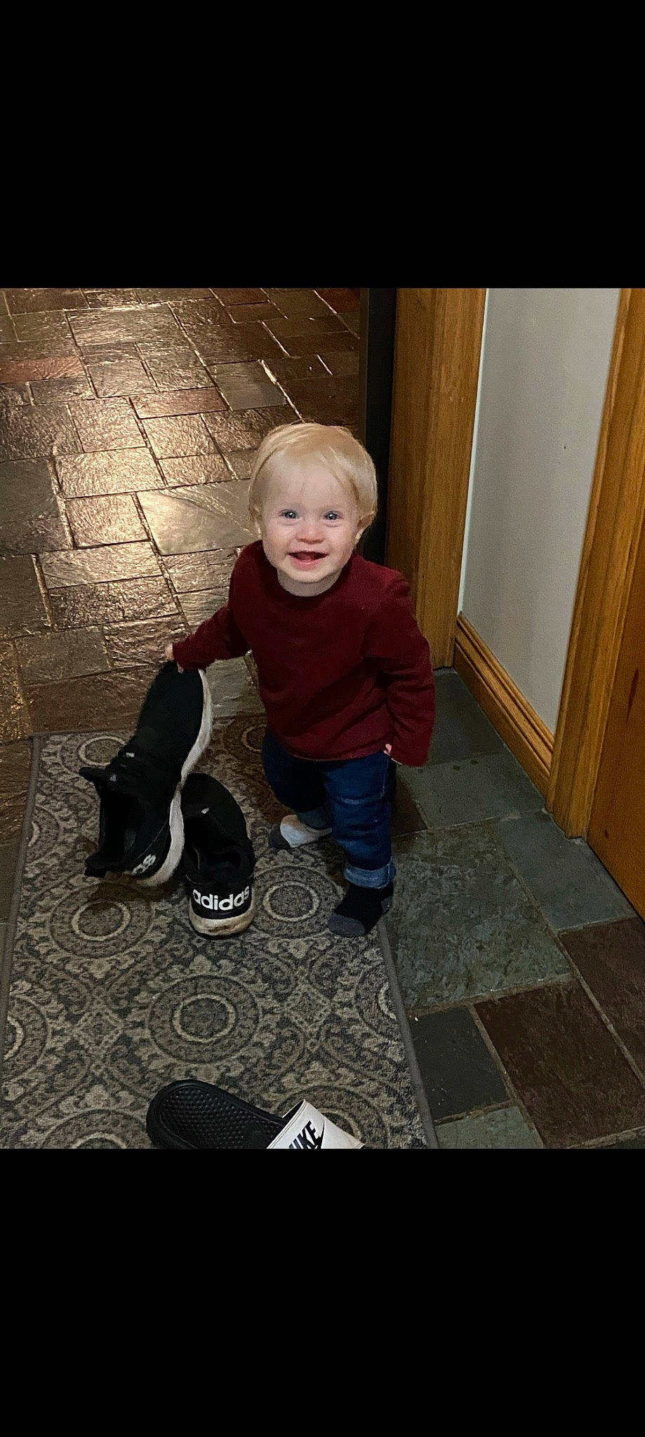 Waylon joined the competition — help win amazing prizes! baby, baby_toddler_clothing, boot, carpet, child, companion_dog, flash_photography, floor, flooring, fun, hardwood, human_leg, joy, leg, pattern, person, room, shadow, sitting, tints_and_shades