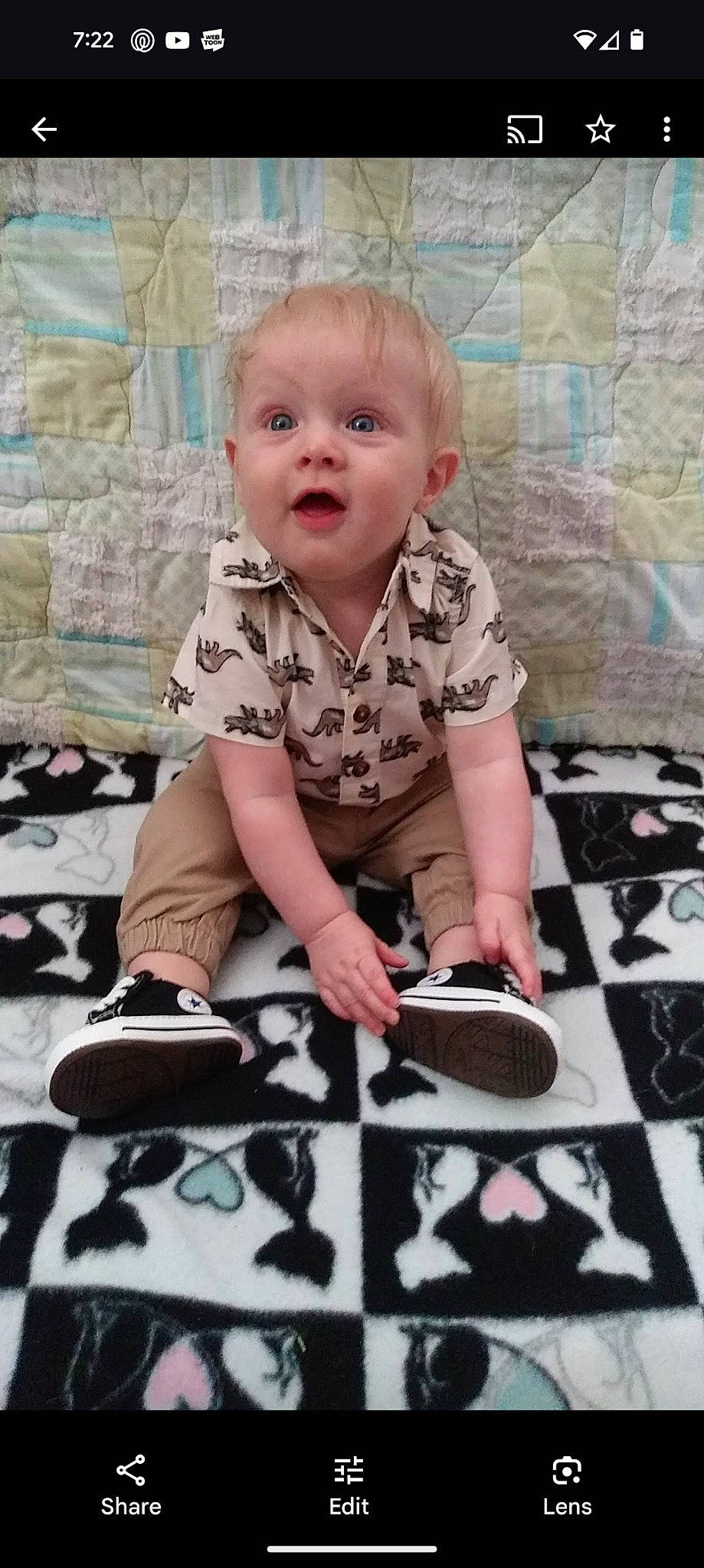 Waylon joined the competition — help win amazing prizes! baby, baby_toddler_clothing, child, comfort, cool, face, floor, flooring, fun, happy, linens, pattern, person, pink, sitting, sleeve, smile, surprise, t_shirt, textile