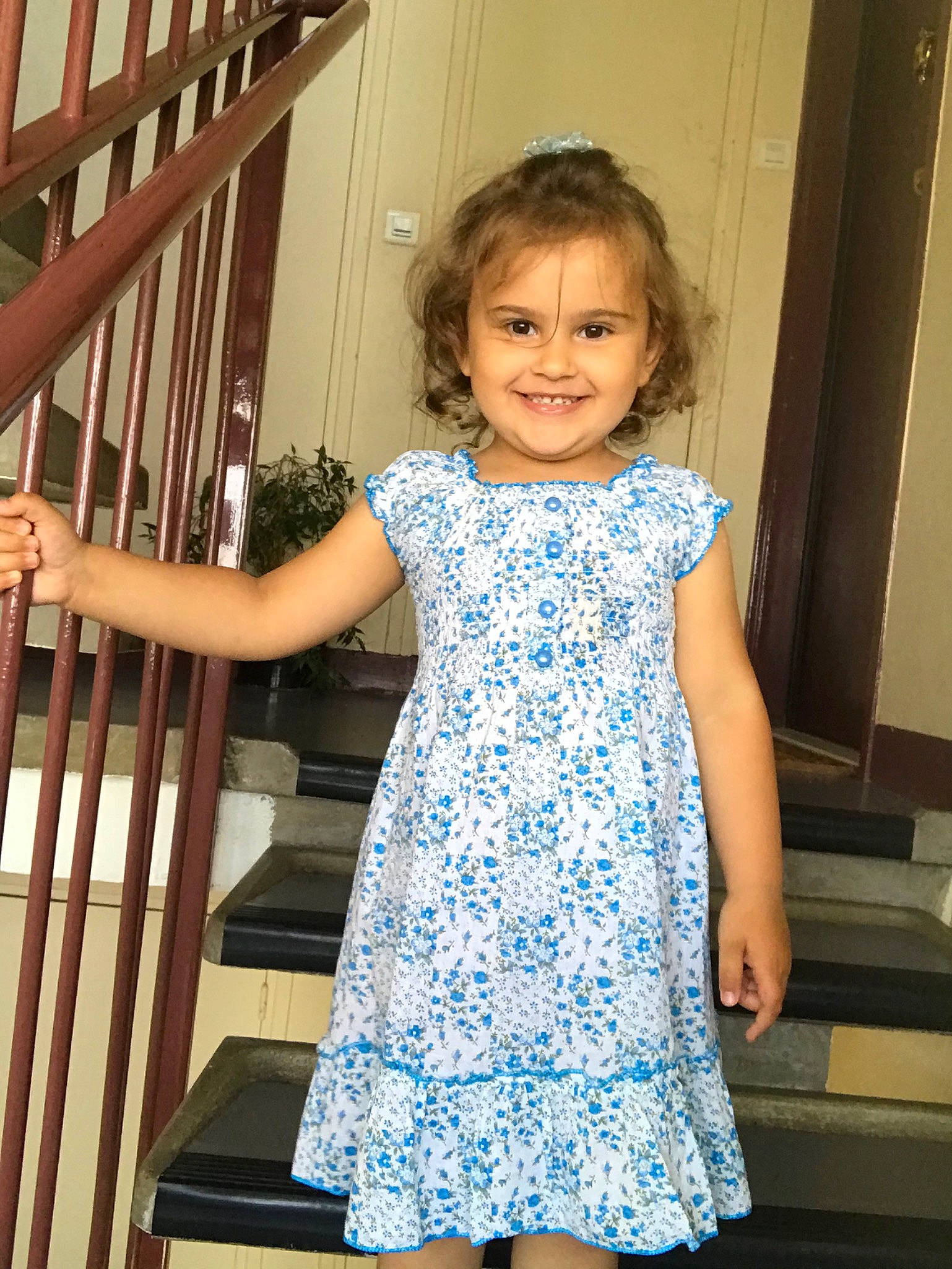 Eliza participe au concours pour gagner de l'argent avec cette photo : arm, baby_toddler_clothing, beauty, child, clothing, day_dress, dress, electric_blue, happy, human_body, joint, joy, one_piece_garment, pattern, person, shoulder, sleeve, smile, standing, toddler