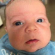 Ayden participe au concours pour gagner de l'argent avec cette photo : baby, close_up, face, blue_towel, curious_eyes, indoor, infant, portrait, soft_lighting, human, child, cute, expression, newborn, skin, mouth, nose, head, clothing, young