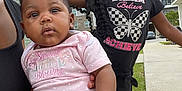 Zanari is registered to the contest to win money with this photo: baby, child, playful, peace_sign, curious, outdoor, suburban, cloudy_sky, onesie, pink_clothing, diaper, smiling_child, family, sibling, person, grass, sidewalk, residential_area, hair_braids, casual_clothing