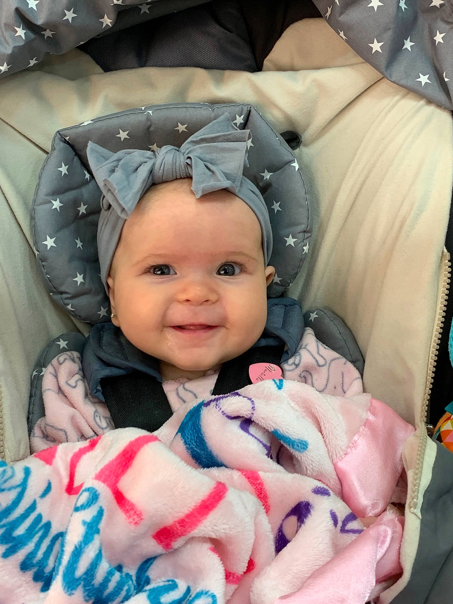 Mariella joined the competition — help win amazing prizes! baby, baby_carriage, baby_products, birth, car_seat, cheek, child, eye, face, happy, head, headgear, headwear, iris, outerwear, people, person, pink, product, skin