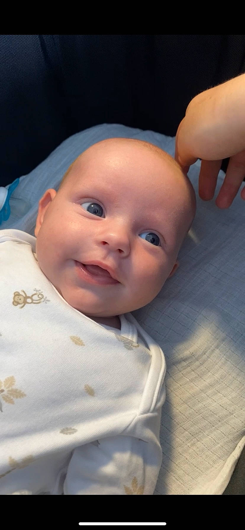 Hugo is registered to the contest to win money with this photo: baby, baby_toddler_clothing, cheek, child, close_up, collar, eye, eyebrow, fun, gesture, happy, iris, lip, nail, nose, person, skin, sleeve, smile, thumb