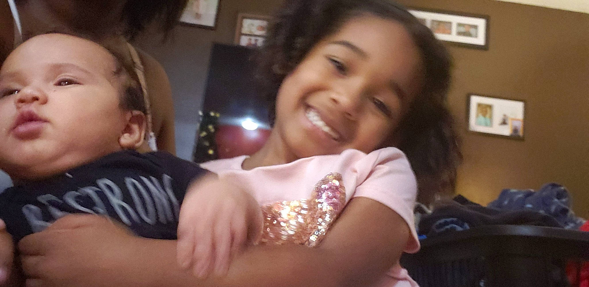 Anya is registered to the contest to win money with this photo: black_hair, cheek, child, ear, eating, face, facial_expression, fun, hand, happy, head, joy, lady, lip, mother, mouth, muscle, neck, nose, person