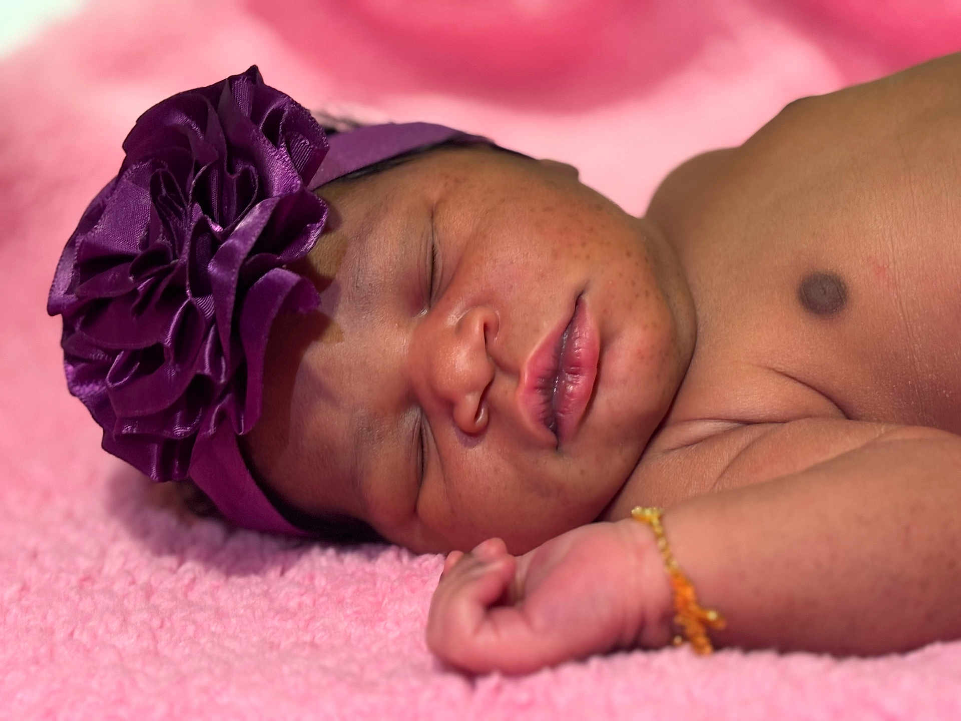 Jaloni joined the competition — help win amazing prizes! baby, sleeping, headband, flower, purple, pink, blanket, skin, face, lips, hand, arm, newborn, peaceful, closeup, infant, cute, soft, resting, child