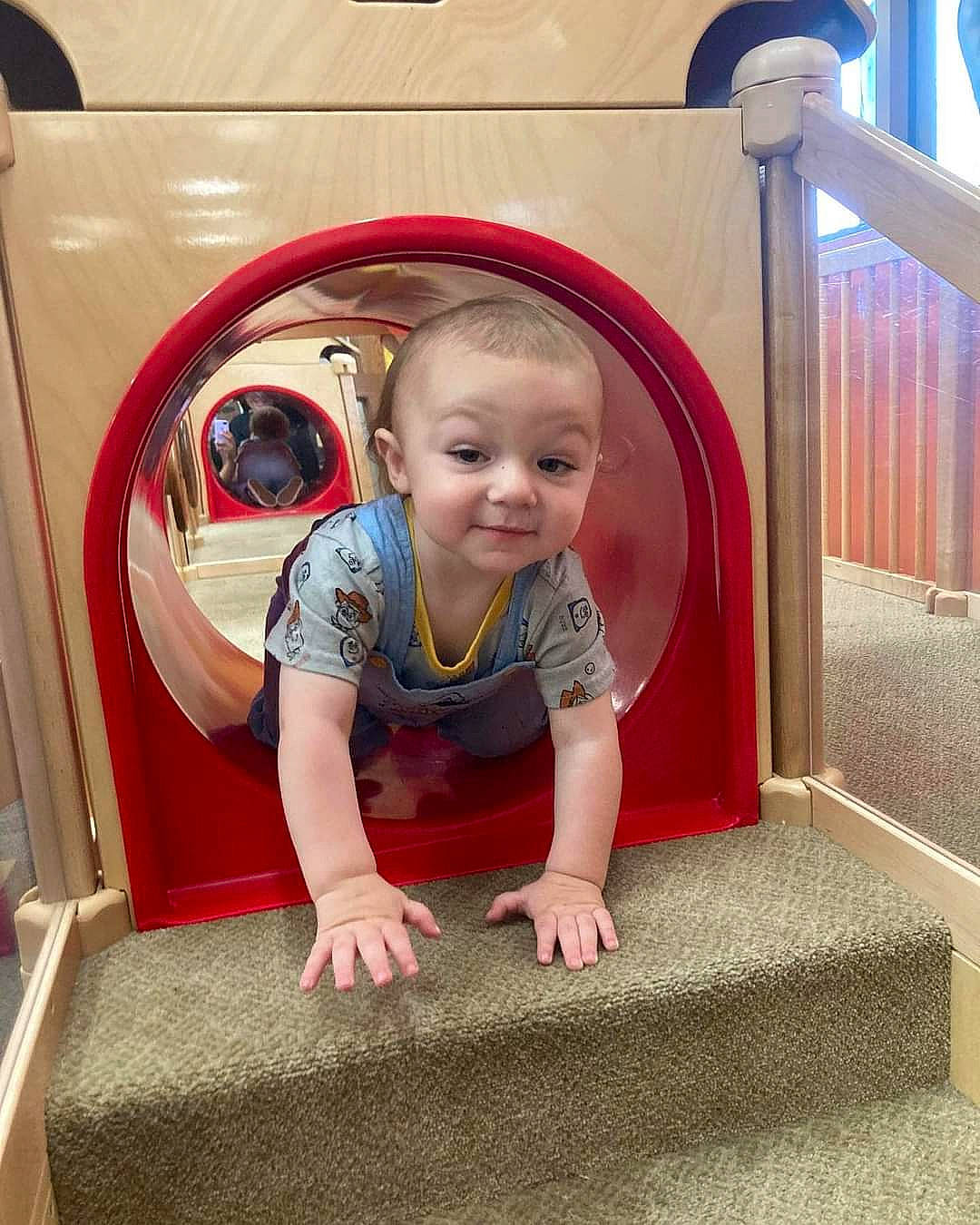 Odin joined the competition — help win amazing prizes! baby, baby_toddler_clothing, child, comfort, flooring, fun, joy, person, play, public_space, room, sitting, sleeve, smile, standing, t_shirt, toddler, vacation, wood