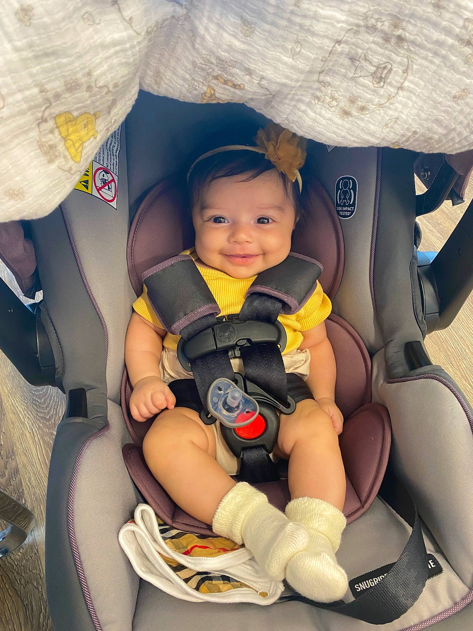 Arielle joined the competition — help win amazing prizes! arm, auto_part, automotive_design, baby, baby_carriage, car_seat, comfort, fun, hand, happy, hat, headwear, joy, mammal, motor_vehicle, person, product, smile, thigh, toddler