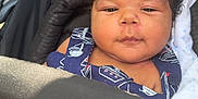 Sevyen joined the competition — help win amazing prizes! baby, infant, stroller, curly_hair, navy_blue_clothing, sailboat_pattern, seatbelt, blanket, child, indoors, face, cute, portrait, young_child, sitting, closeup, sunlight, comfort, rest, peaceful