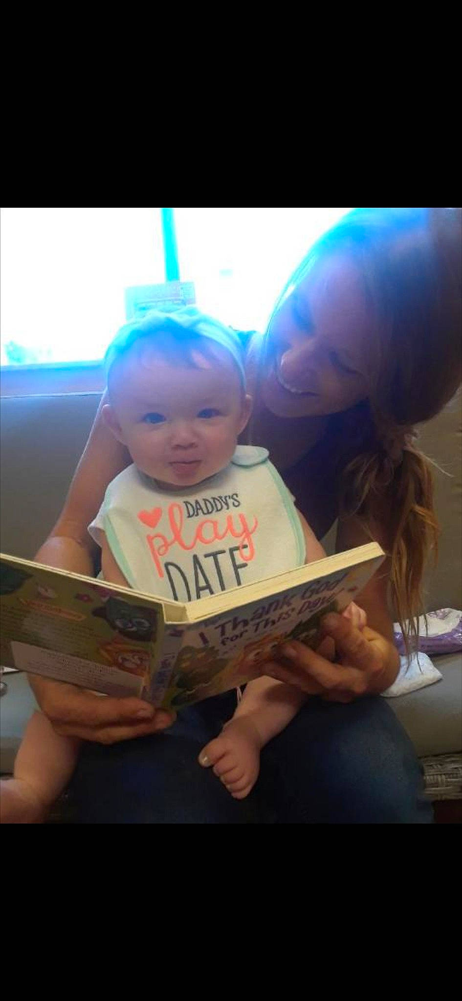 Taytum joined the competition — help win amazing prizes! baby, child, fun, happy, person, reading, sitting, smile, toddler