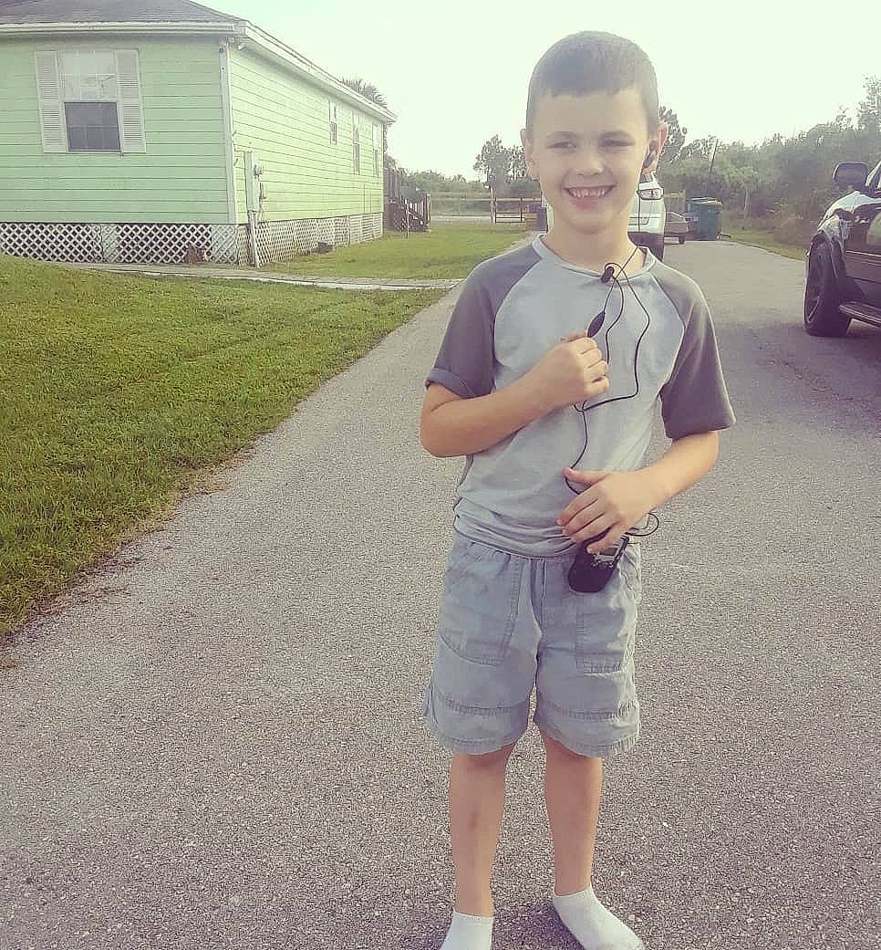 Tyler joined the competition — help win amazing prizes! asphalt, child, cool, denim, footwear, fun, grass, joy, person, shoe, shorts, smile, snapshot, standing, summer, t_shirt, toddler, vacation