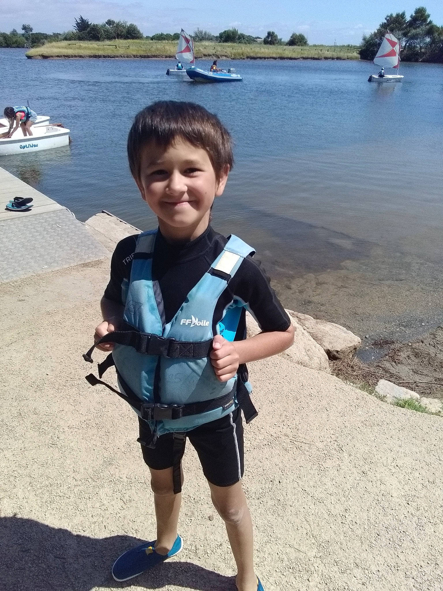 Loïc participe au concours pour gagner de l'argent avec cette photo : beach, child, holiday, joy, leg, leisure, lifejacket, person, personal_protective_equipment, recreation, summer, toddler, tourism, vacation, vehicle
