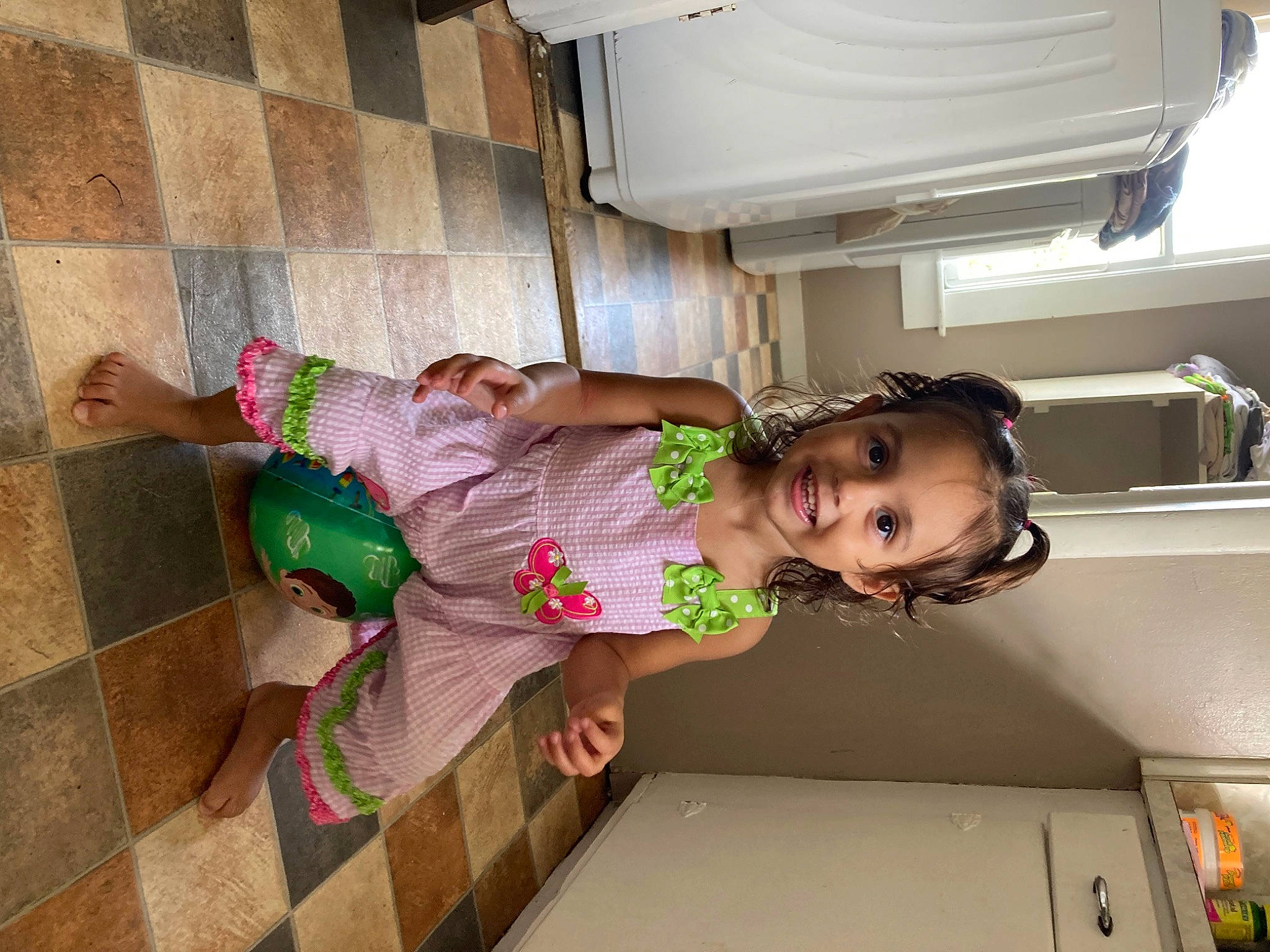 Alaia is registered to the contest to win money with this photo: baby, baby_products, baby_safety, baby_toddler_clothing, child, comfort, floor, flooring, fun, happy, hardwood, human_leg, joy, leisure, magenta, person, room, sock, t_shirt, thigh