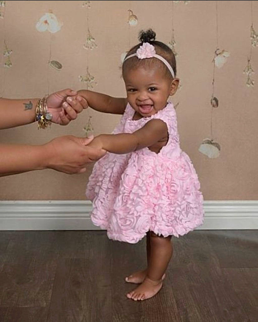 Dylan joined the competition — help win amazing prizes! baby, baby_toddler_clothing, child, costume, dance, dress, fashion_accessory, footwear, hair_accessory, joy, person, pink, shoe, smile, toddler