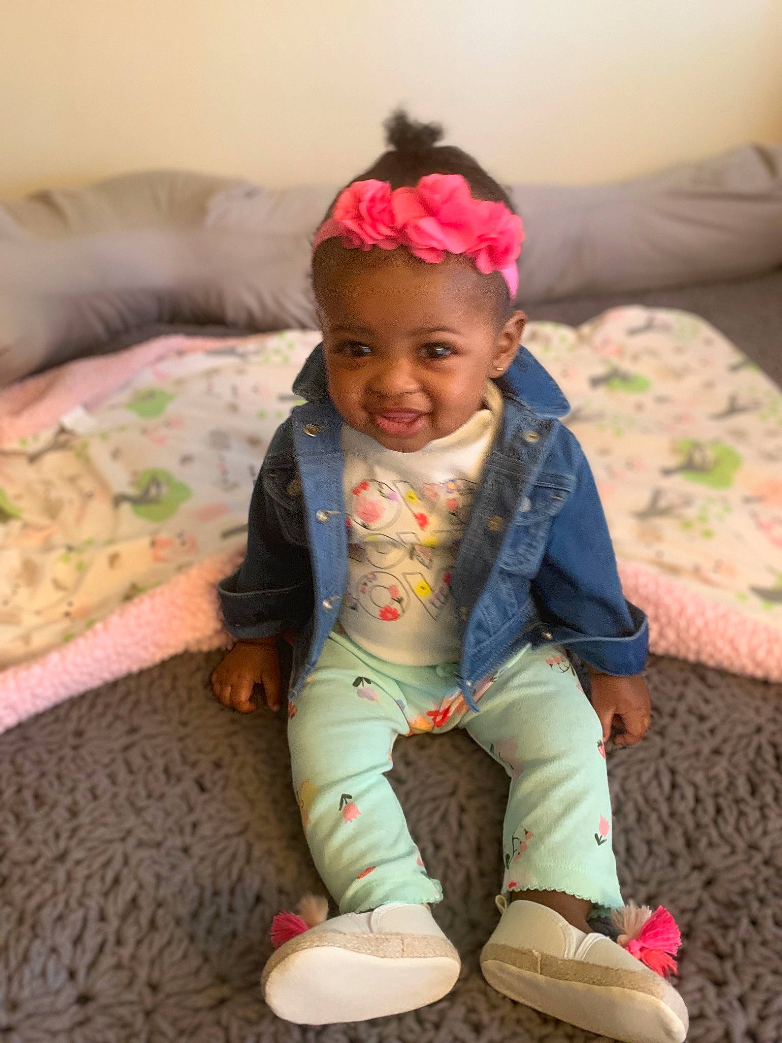 Dylan is registered to the contest to win money with this photo: baby, baby_toddler_clothing, cheek, child, fashion_accessory, hair_accessory, headband, headgear, joy, person, pink, play, shoe, sitting, skin, smile, toddler