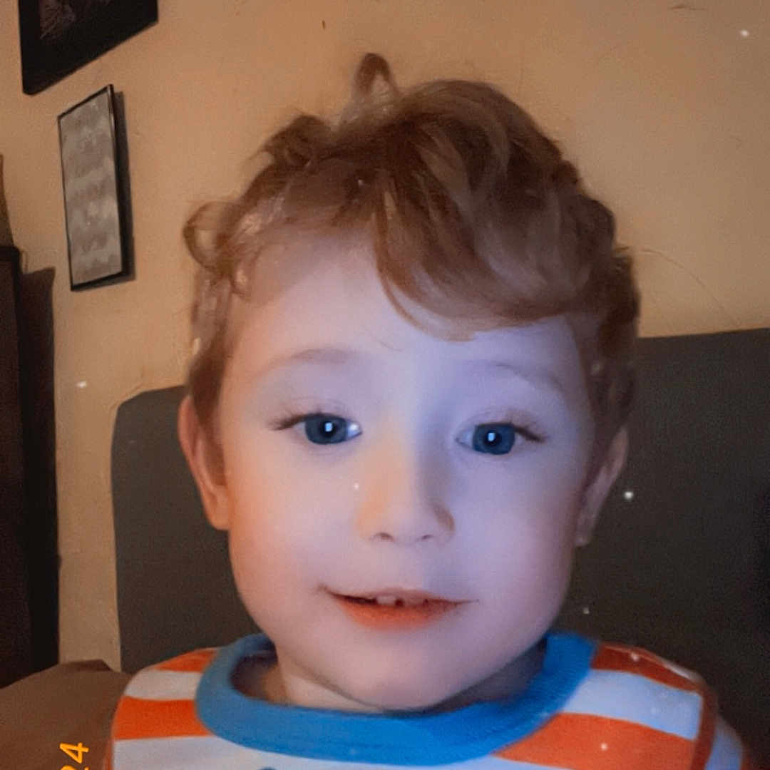 Ashton joined the competition — help win amazing prizes! architecture, baby, bodypart, building, clothing, face, furniture, hair, happy, head, indoors, mouth, person, photoframe, photography, portrait, shirt, smile, t_shirt, teeth