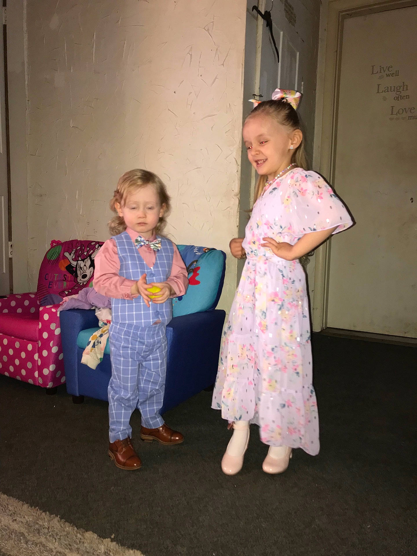 Ashton is registered to the contest to win money with this photo: accessories, child, clothing, couch, dress, face, female, footwear, formalwear, furniture, girl, head, jewelry, necklace, pants, person, photography, portrait, shoe, tie