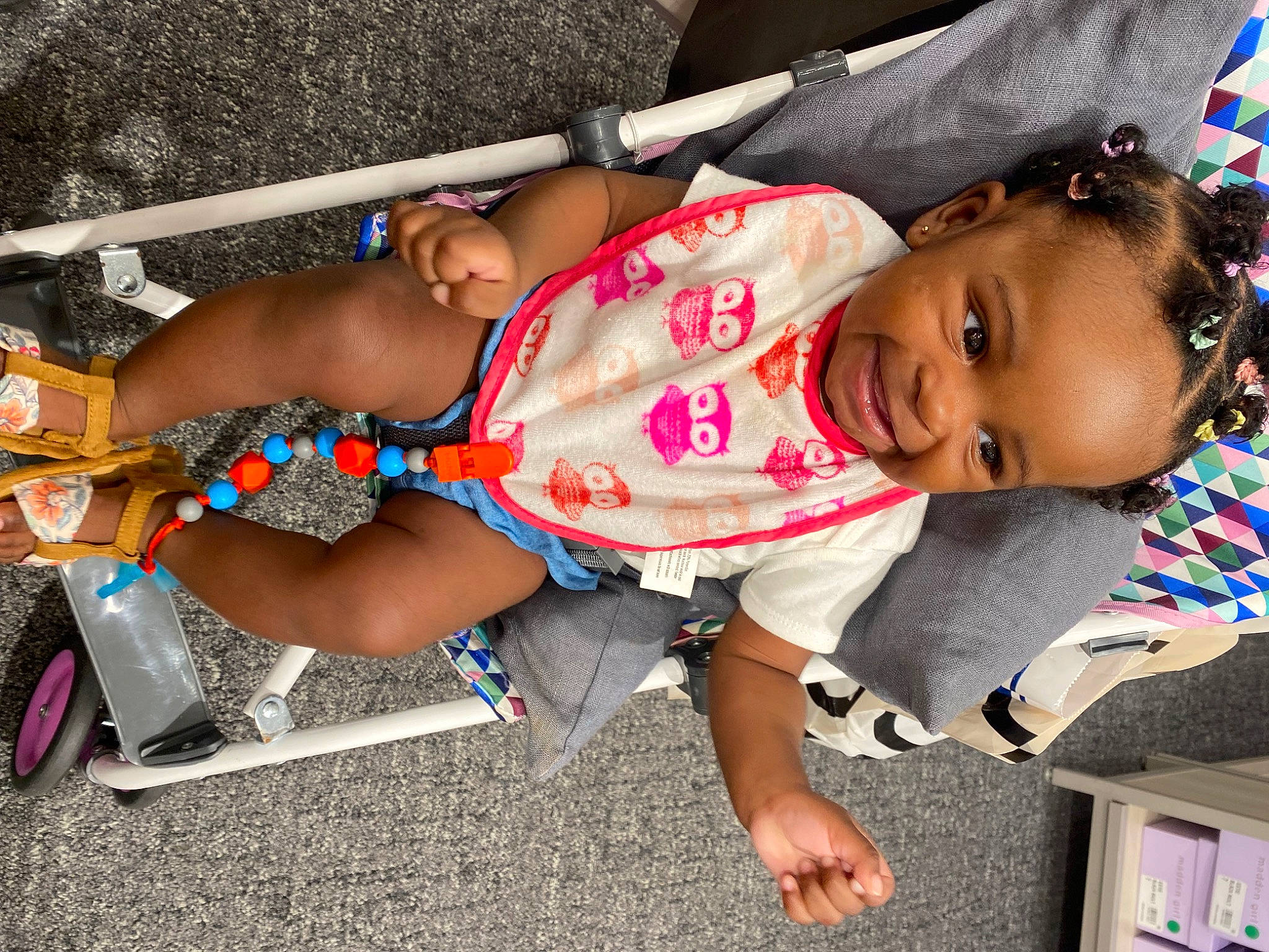 Maliyah joined the competition — help win amazing prizes! baby, baby_toddler_clothing, child, cool, fun, happy, hat, human_leg, leisure, person, recreation, sandal, shorts, sitting, smile, thigh, tire, toddler, travel, trunk