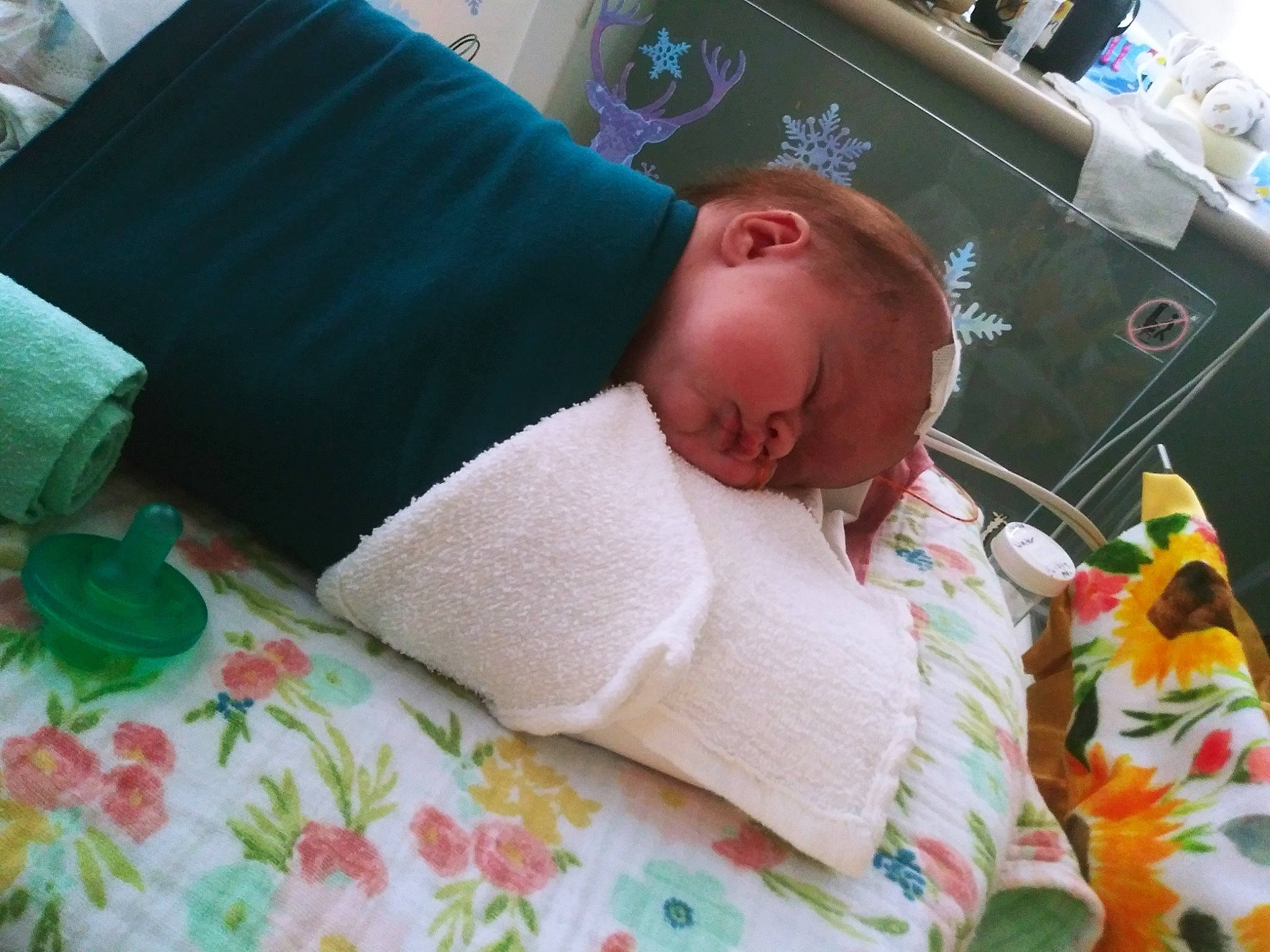 Jazmyn is registered to the contest to win money with this photo: baby, baby_products, baby_safety, bed, bed_sheet, bedding, bedroom, bedtime, child, comfort, green, hospital, infant_bed, linens, nap, person, play, room, sleep, textile