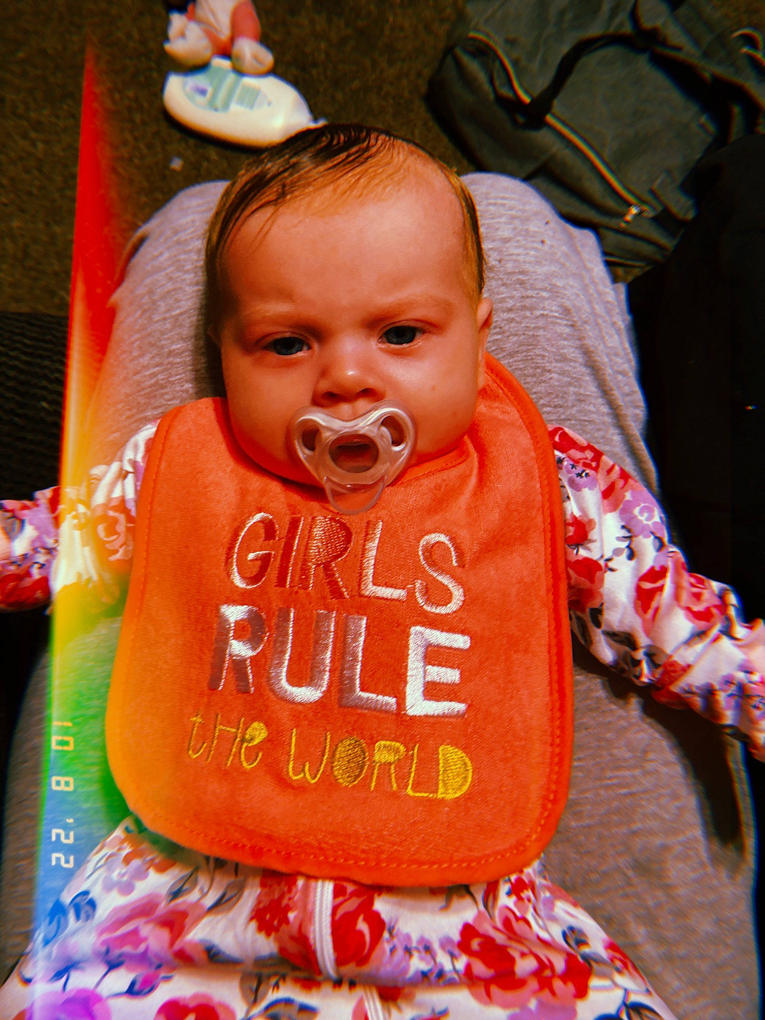 Ariya joined the competition — help win amazing prizes! baby, baby_carriage, baby_products, baby_toddler_clothing, bib, cheek, child, event, fun, grass, happy, head, linens, peach, person, pink, sitting, skin, toddler