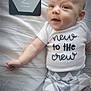 Jameson joined the competition — help win amazing prizes! baby, infant, milestone_card, 2_months, onesie, patterned_pants, bed, blanket, smile, face, child, newborn, cute, lying_down, white_clothing, soft_lighting, portrait, close_up, indoors, person
