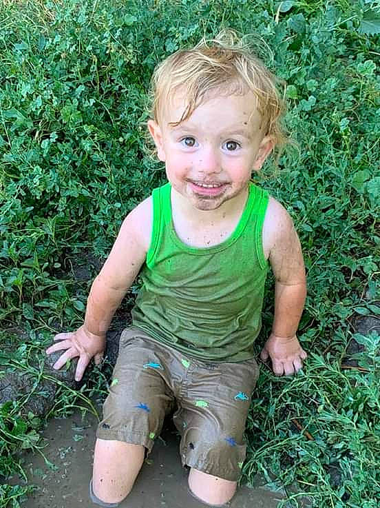 Joey is registered to the contest to win money with this photo: blond, child, child_model, grass, green, joy, person, plant, toddler