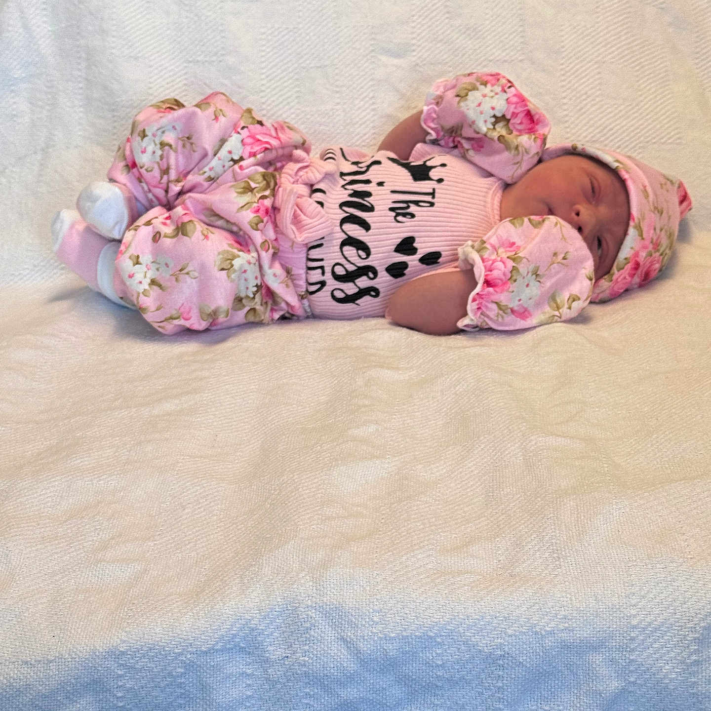 Amyla joined the competition — help win amazing prizes! baby, blanket, child, clothing, cozy, cute, floral_pattern, hat, indoors, infant, lying_down, mittens, newborn, peaceful, person, pink_clothing, portrait, resting, sleeping, soft_texture