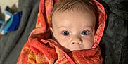 Cohen joined the competition — help win amazing prizes! baby, blanket, face, head, hiding, person, quilt