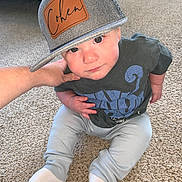 Cohen joined the competition — help win amazing prizes! baby, baseballcap, bodypart, cap, clothing, face, finger, footwear, hand, hat, head, hosiery, jeans, pants, person, photography, portrait, shoe, sock, t_shirt