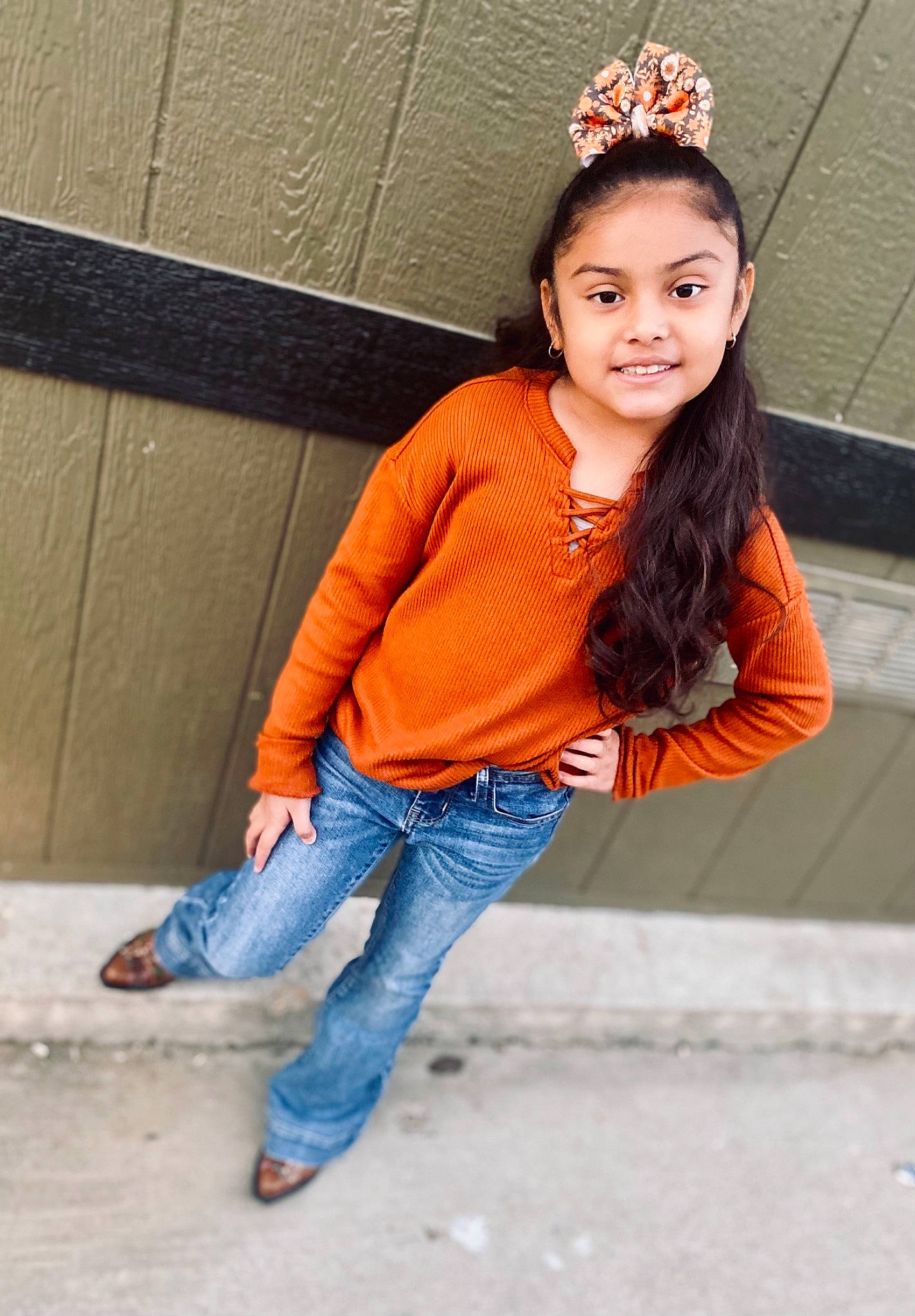 Shayla is registered to the contest to win money with this photo: denim, electric_blue, eyewear, happy, head, headgear, headpiece, jeans, jewellery, joy, lip, long_hair, neck, orange, person, sleeve, smile, standing, street_fashion, textile