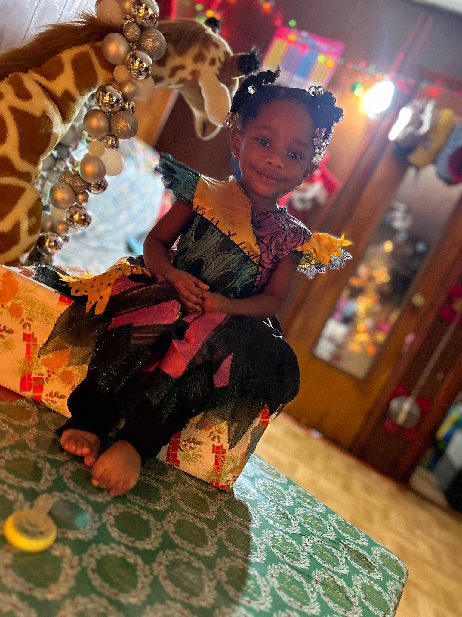 Leilani is registered to the contest to win money with this photo: child, costume, entertainment, event, fashion_accessory, fashion_design, flooring, fun, happy, jewellery, joy, leisure, pattern, performance, performance_art, performing_arts, person, room, toddler, tradition